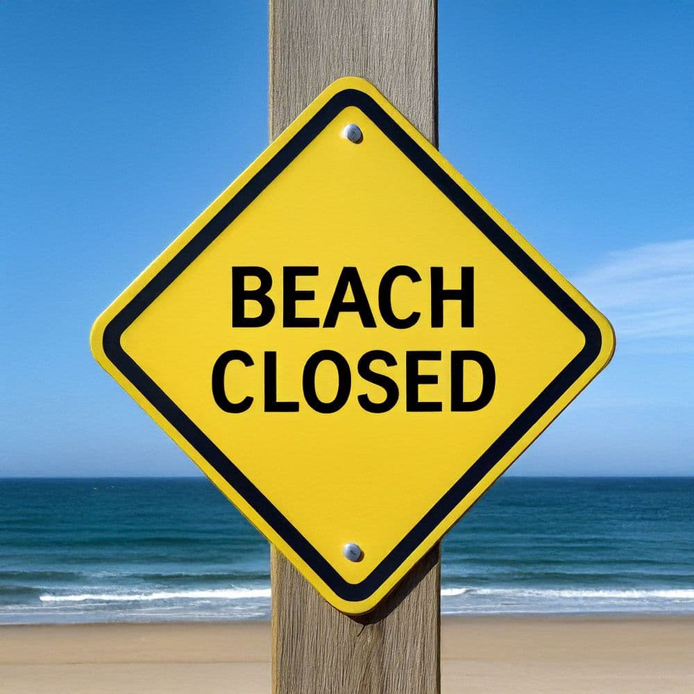Beach closed sign