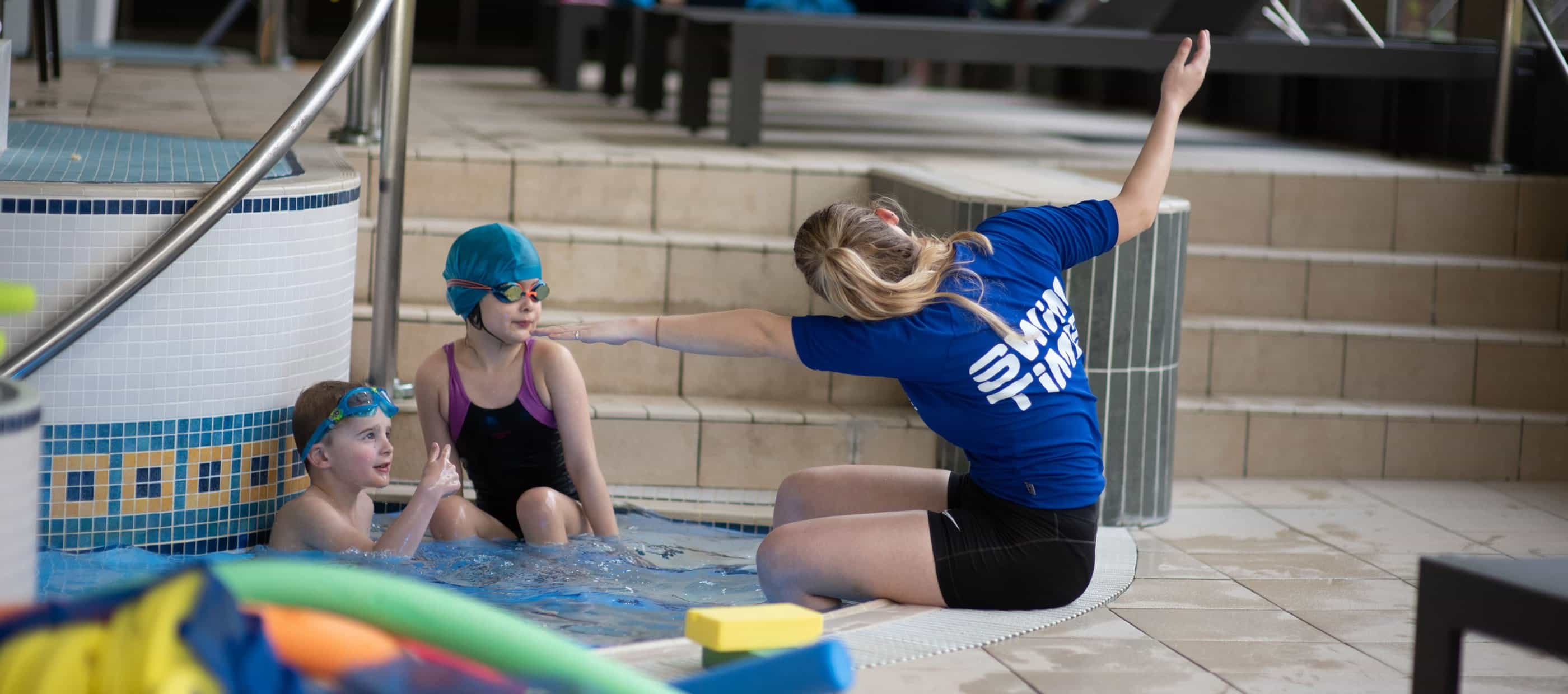 Instructor demonstrating to children